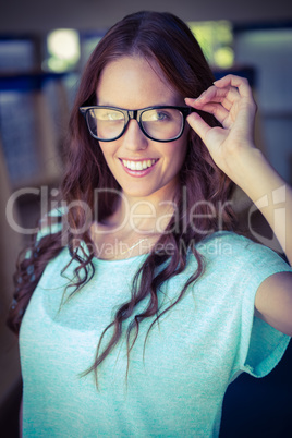 Pretty woman shopping for new glasses