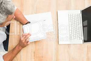 Casual businessman using blank screen tablet