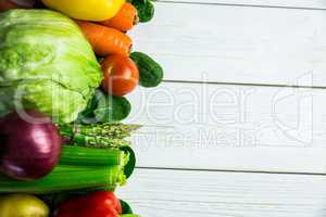 Line of vegetables on table