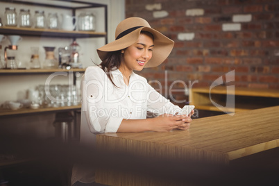 Casual businesswoman using her phones