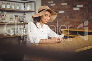 Casual businesswoman using her phones