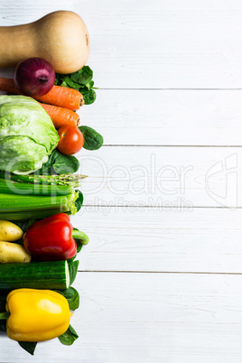 Line of vegetables on table