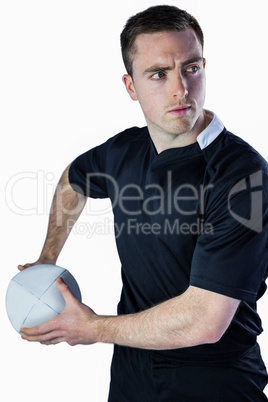 Rugby player about to throw a rugby ball