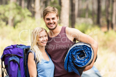 Young happy joggers looking at camera