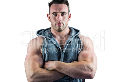 Handsome bodybuilder with arms crossed