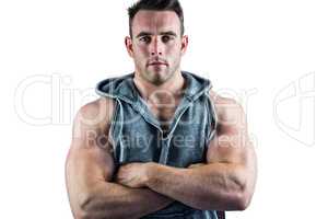 Handsome bodybuilder with arms crossed