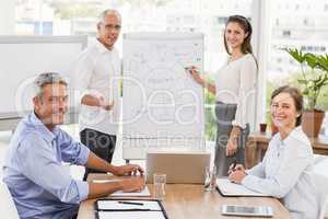 Smiling business people having a meeting