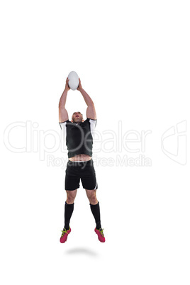 Rugby player catching the ball