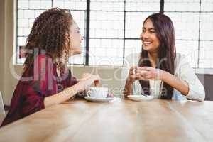 Female friends having coffee