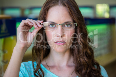 Woman shopping for new glasses