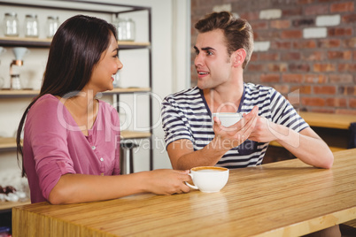 Cute couple drinking a coffee together