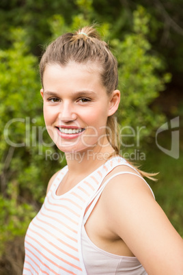 Smiling blonde athlete looking at camera