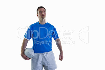 Rugby player holding a rugby ball