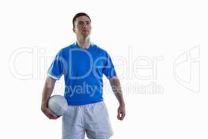 Rugby player holding a rugby ball