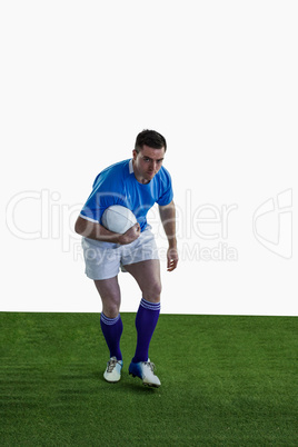 Rugby player running with the rugby ball