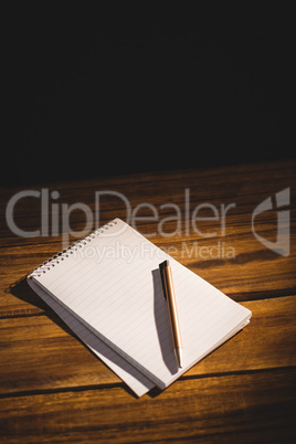View of a notepad with pen View of a notepad with pen