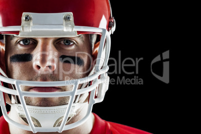 American football player looking at camera American football player looking at camera