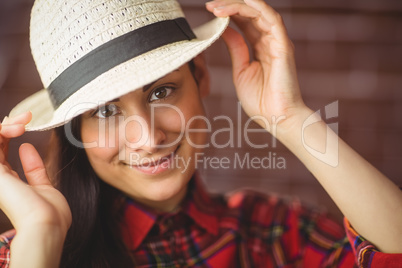 Beautiful hipster smiling at camera