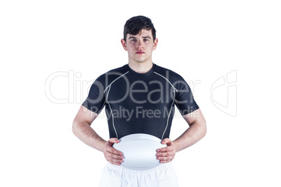 Rugby player holding a rugby ball