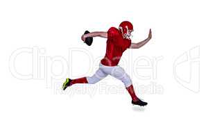 American football player jumping with the ball