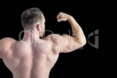 Strong bodybuilder with arms up