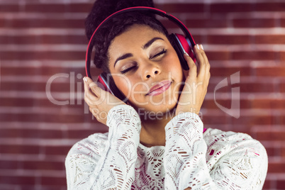 Young woman enjoying her music