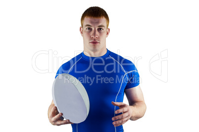 Rugby player holding rugby ball