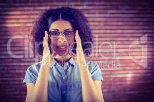 Smiling attractive hipster posing with glasses