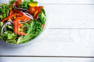 Healthy bowl of salad on table