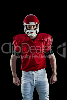 Portrait of american football player wearing his helmet