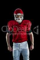 Portrait of american football player wearing his helmet