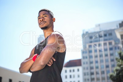 An handsome athlete looking away