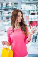 Pretty woman shopping for make up