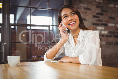 Casual businesswoman using her phones