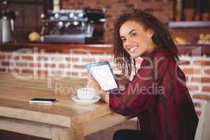 Woman using digital tablet