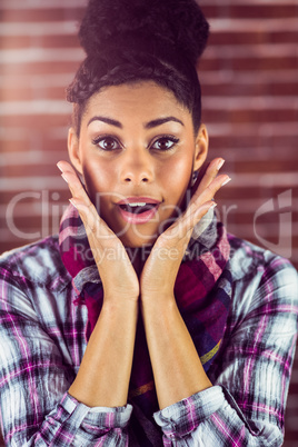 A surprised young female hipster