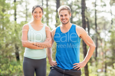 Happy joggers looking at camera