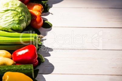 Line of vegetables on table