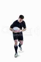 Rugby player running with the rugby ball