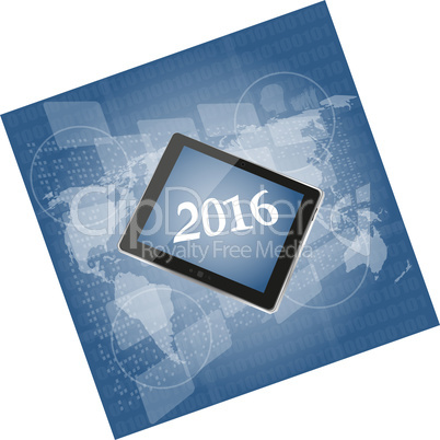 tablet pc or smart phone on business digital touch screen, world map, happy new year 2016 concept