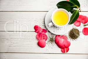 Cup of herbal tea on table