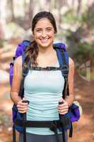 Happy jogger looking at camera