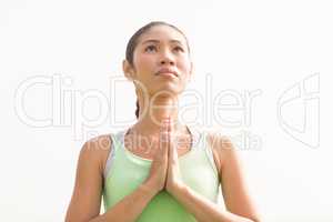 Focused sporty woman doing yoga