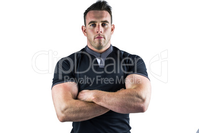 Tough rugby player looking at camera