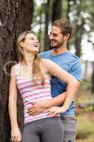 Young happy hiker couple laughing