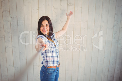 Pretty hipster taking a selfie with stick