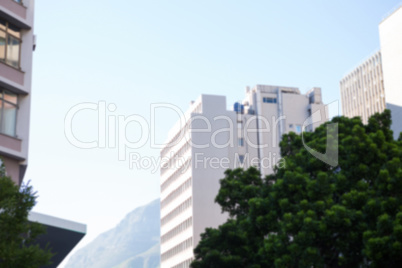 Large buildings against sunny sky