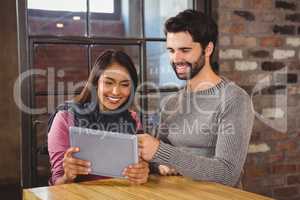 Couple looking at the tablet