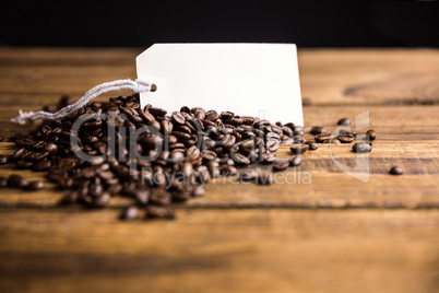 Coffee beans on a table with tag