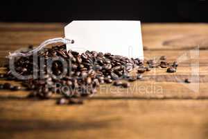 Coffee beans on a table with tag